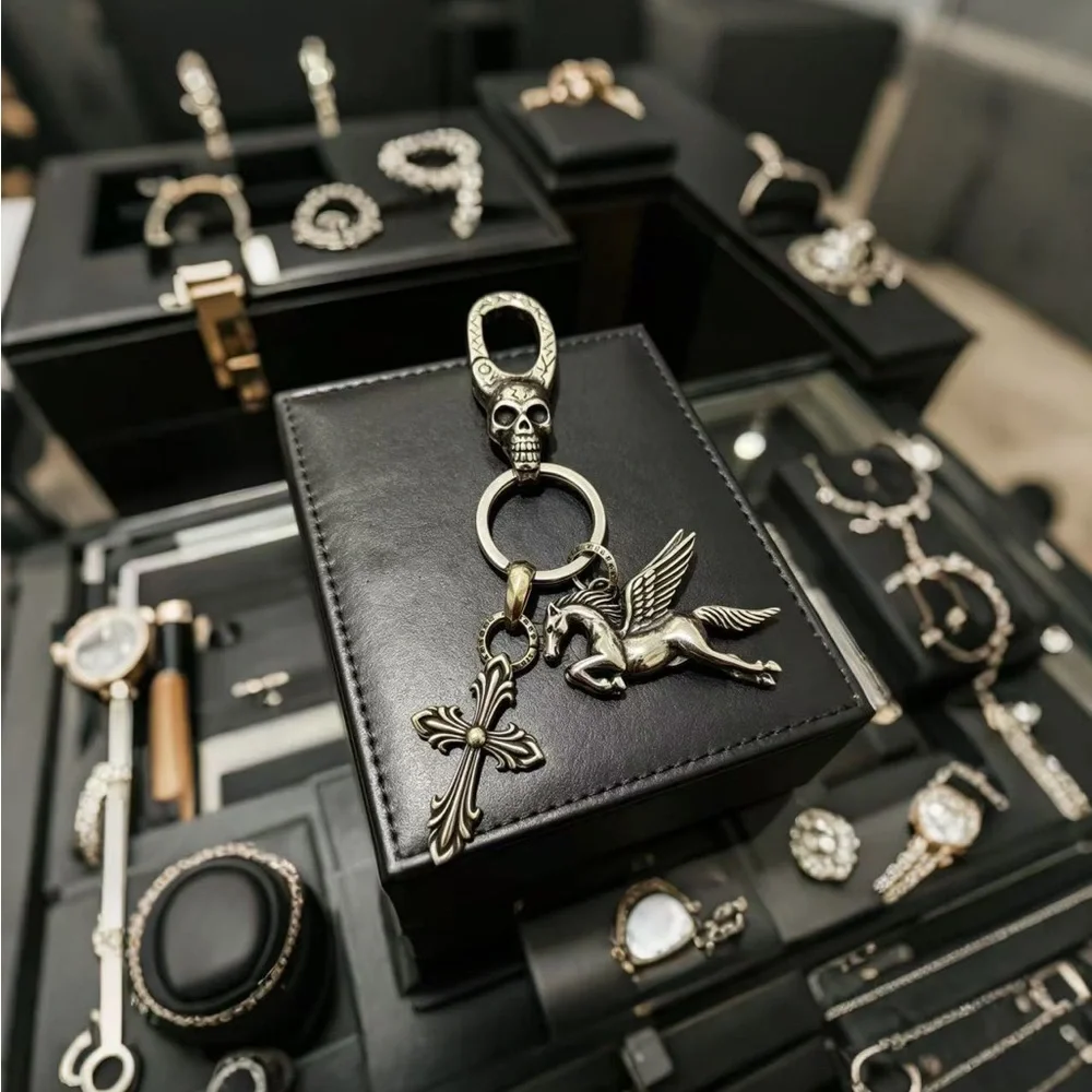 Chrome Hearts Silver Skull Clip Keychain with Pegasus and Cross Charms